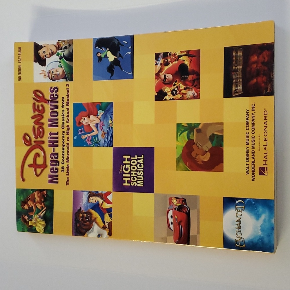 Disney Mega Hit Movies Sheet Music Book for Piano